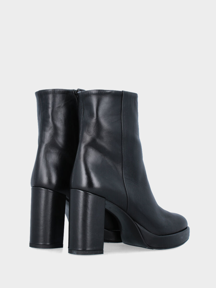 Black leather ankle boot with round toe and platform