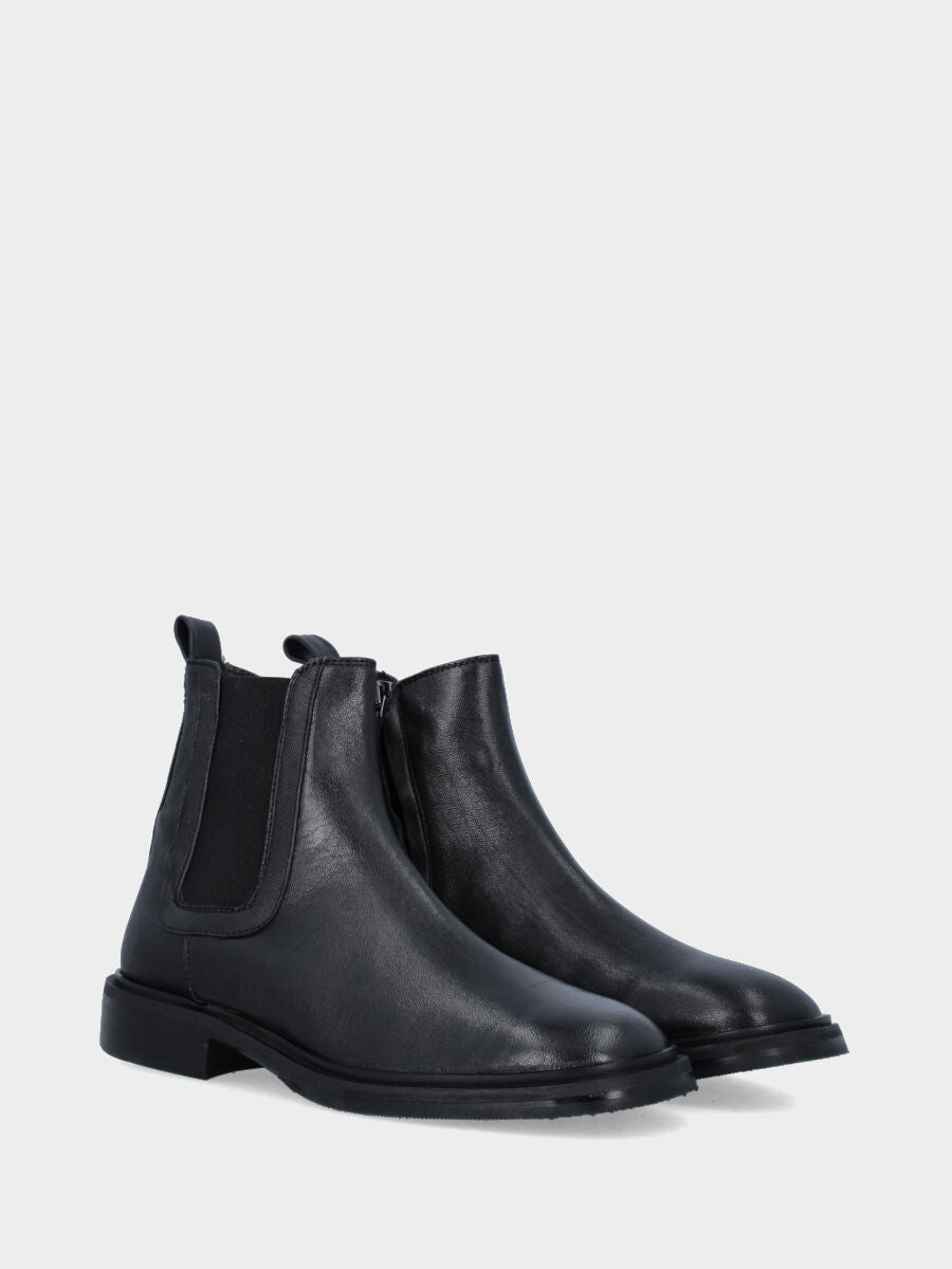 Black smooth leather beatle ankle boot with low heel