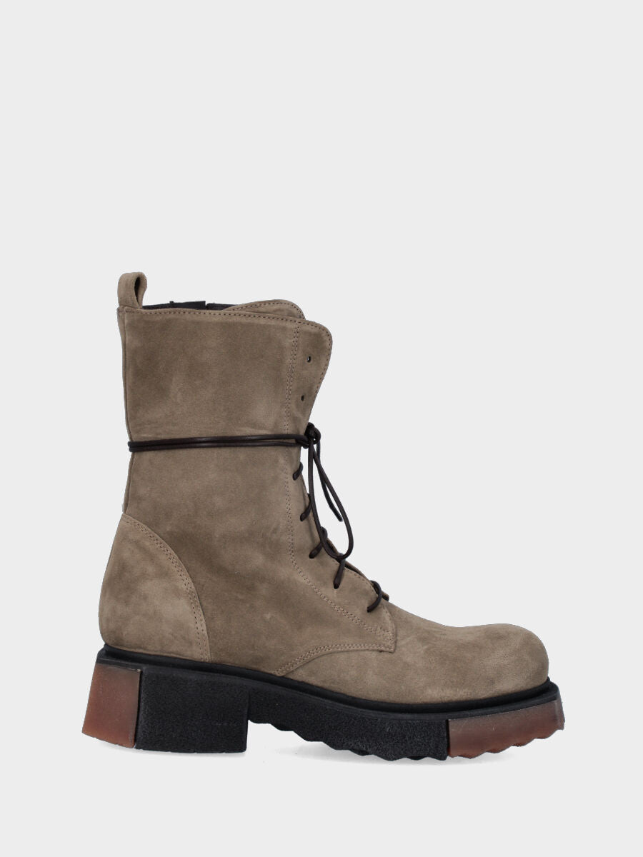Green leather combat boot with two-tone sole