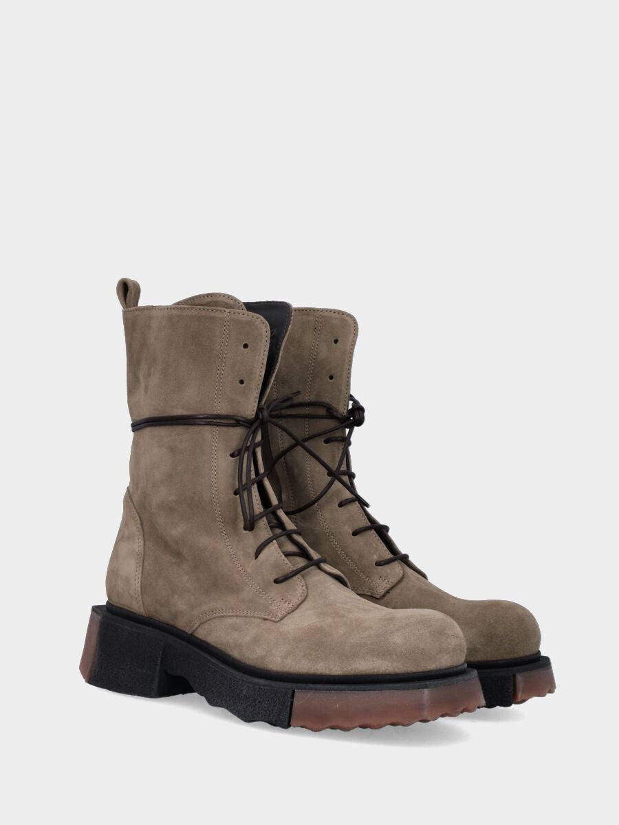 Green leather combat boot with two-tone sole