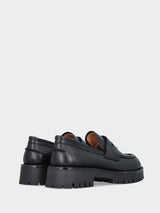 Mocassino monoblocco in vitello nero con platform