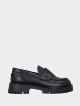 Mocassino monoblocco in vitello nero con platform