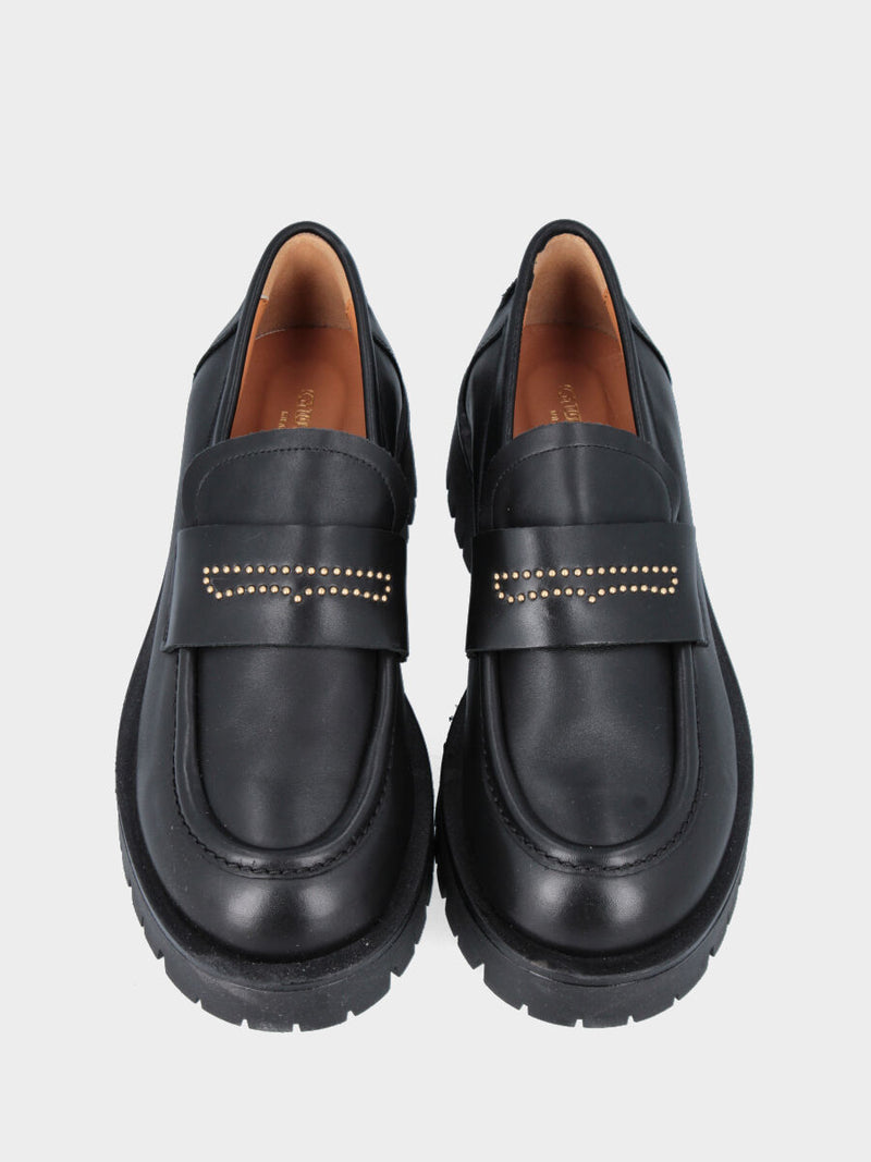 Mocassino monoblocco in vitello nero con borchie