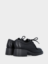 Stringata paraboot in vitello nero con tacco monoblocco
