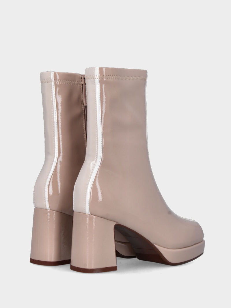 Stivaletto in ecopelle nude lucido con fascia bicolore e plateau