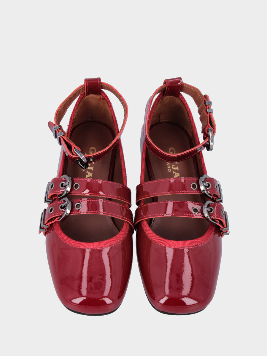 Sandalo monoblocco in vitello rosso con fascia ripiegata