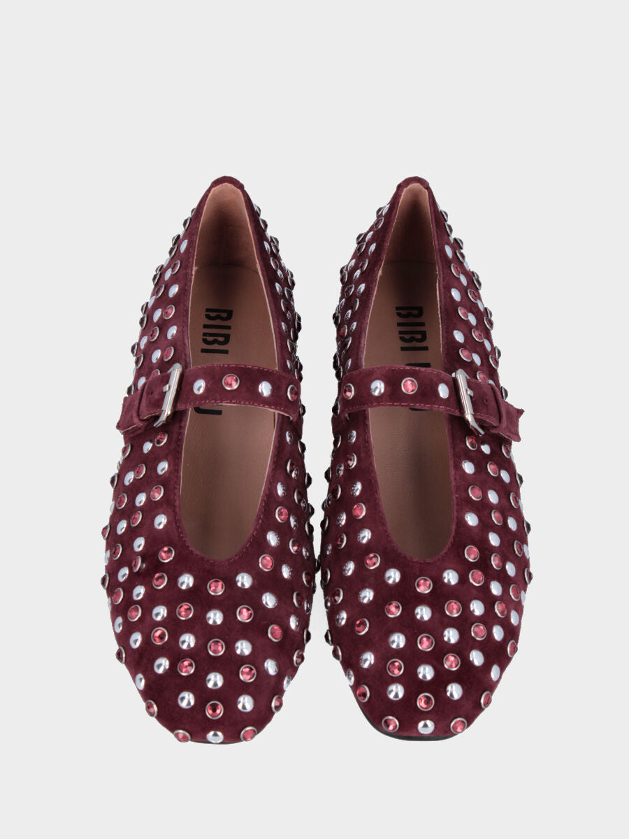Ballerine en cuir façon poulain bordeaux avec clous et bride