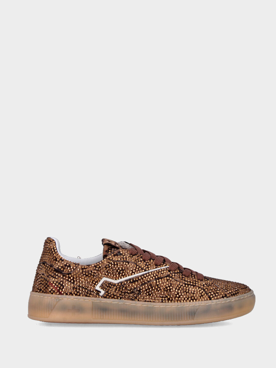 Sneaker in cavallino maculato con multistrass e suola in gomma