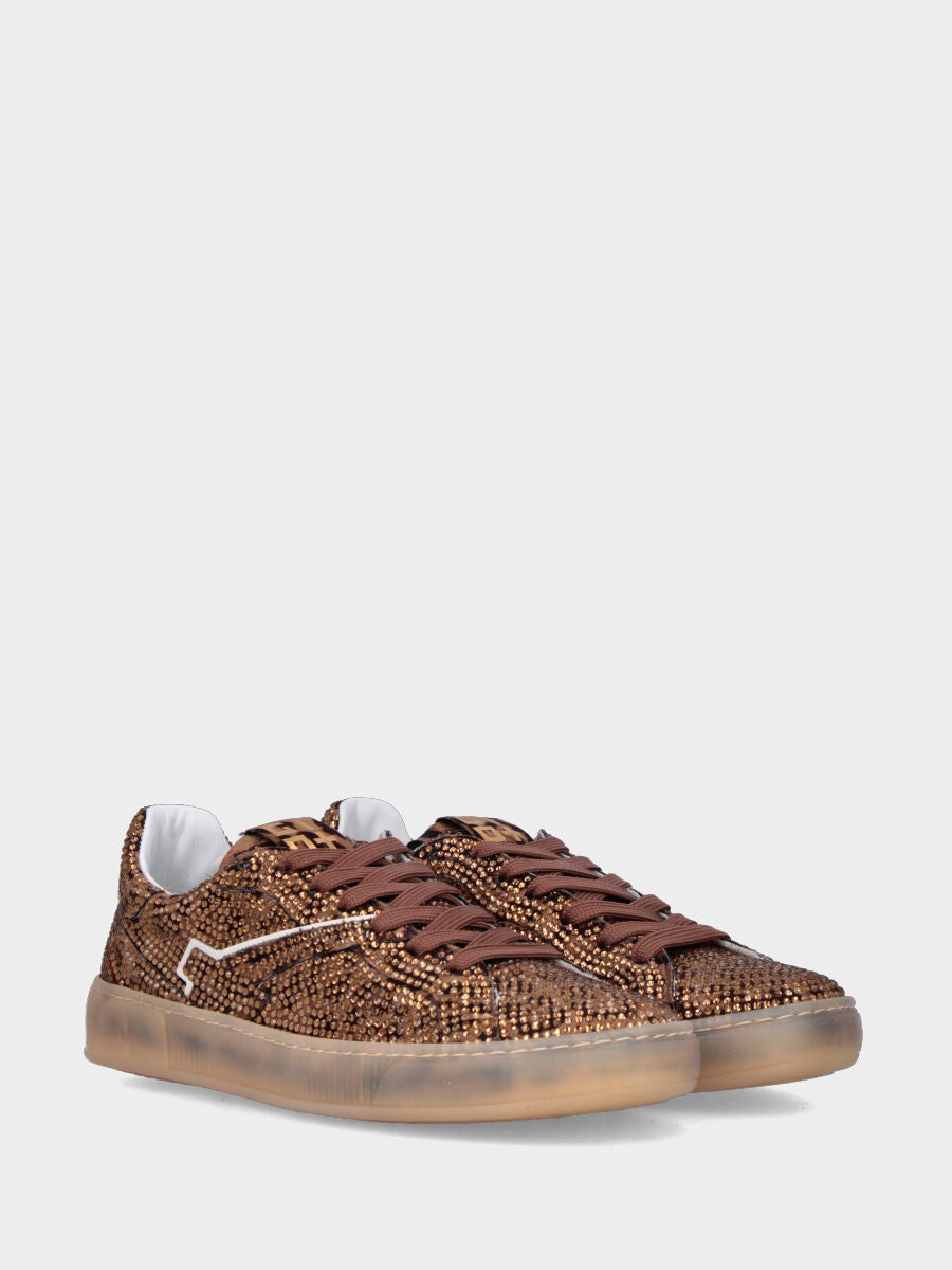 Sneaker in cavallino maculato con multistrass e suola in gomma