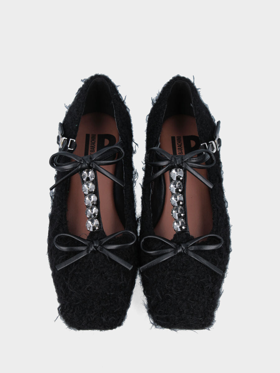 Ballerina in astrakan nero con cinturino e strass