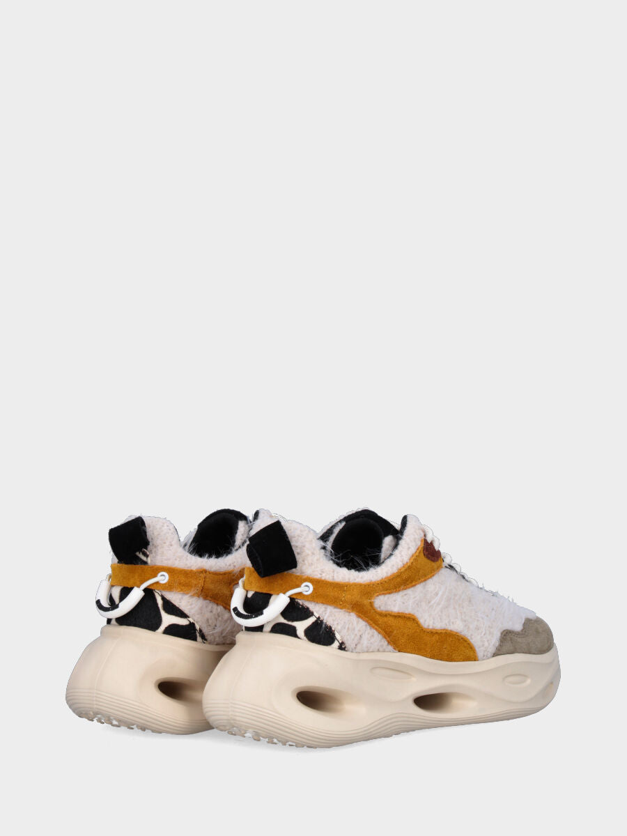 Sneaker in tessuto multicolor con suola monoblocco ondulata e traforata