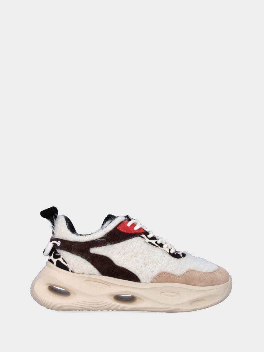 Sneaker in tessuto multicolor con suola monoblocco ondulata e traforata