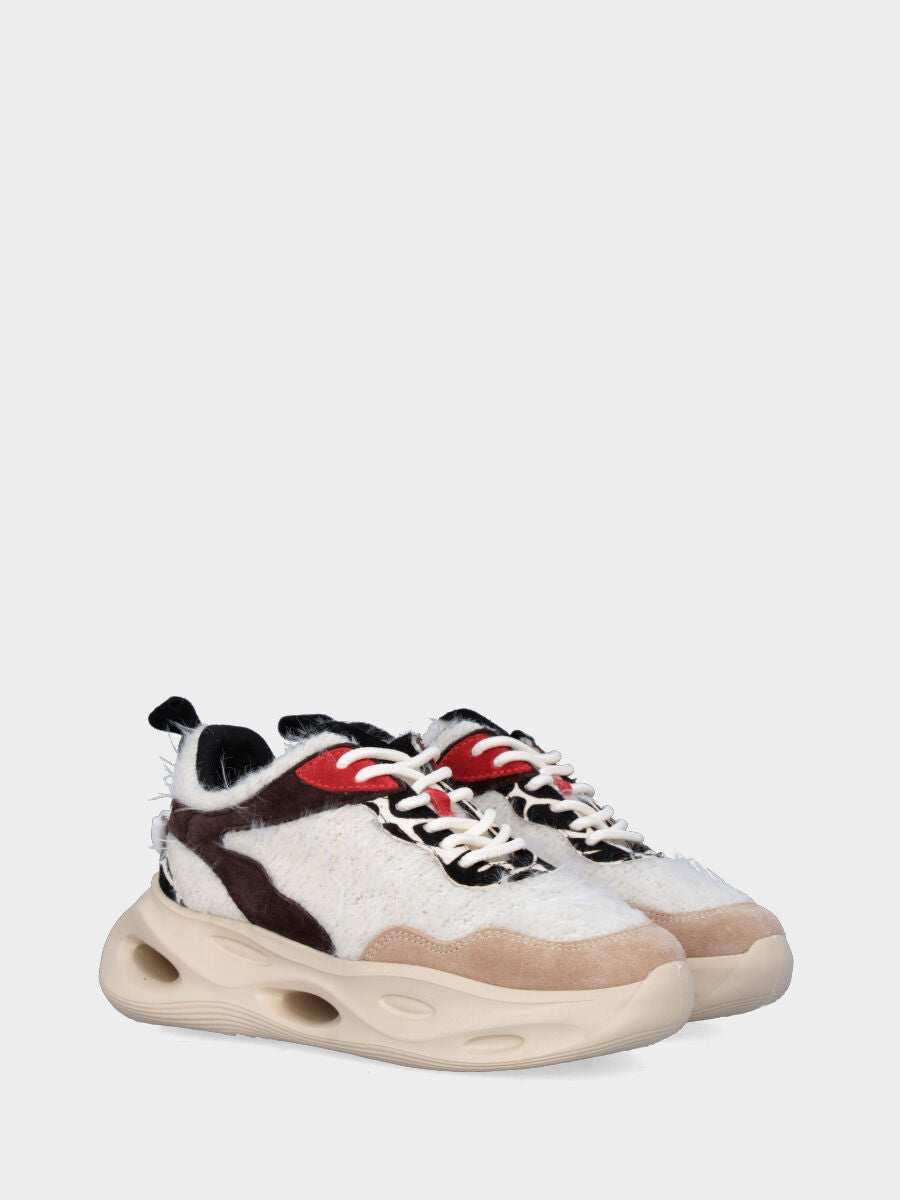 Sneaker in tessuto multicolor con suola monoblocco ondulata e traforata