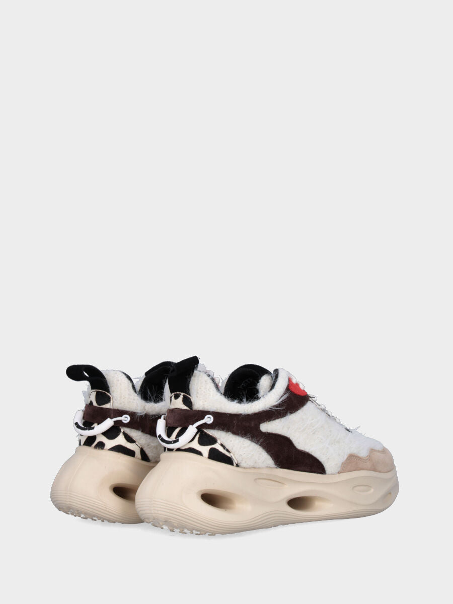 Sneaker in tessuto multicolor con suola monoblocco ondulata e traforata