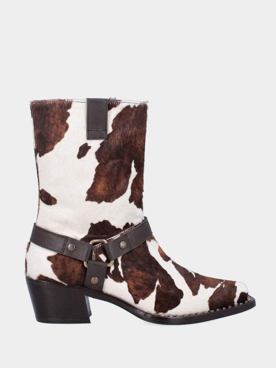 Bottines western en cuir façon poulain moucheté avec clous et étrier
