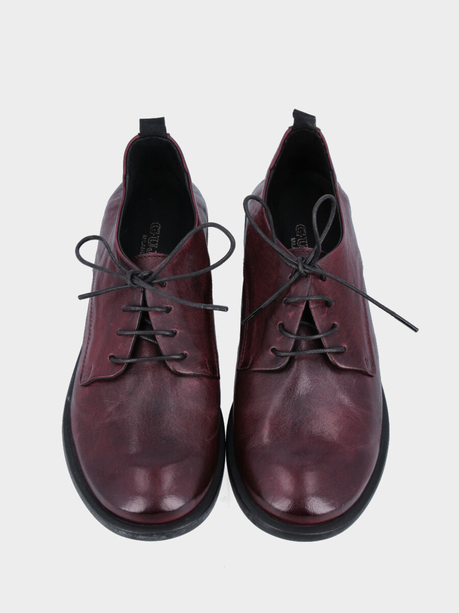 Sandalo monoblocco in vitello rosso con fascia ripiegata