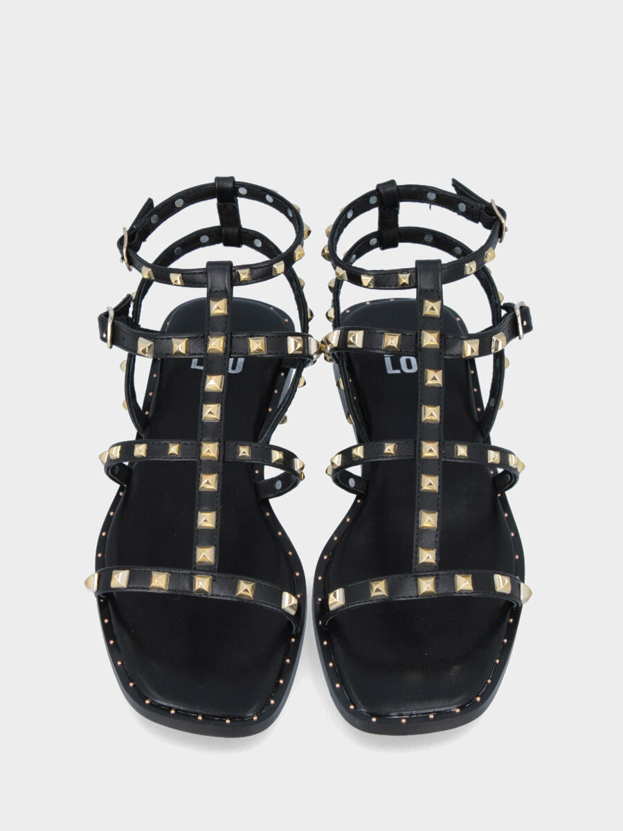 Sandalo nero in pelle con borchie metalliche