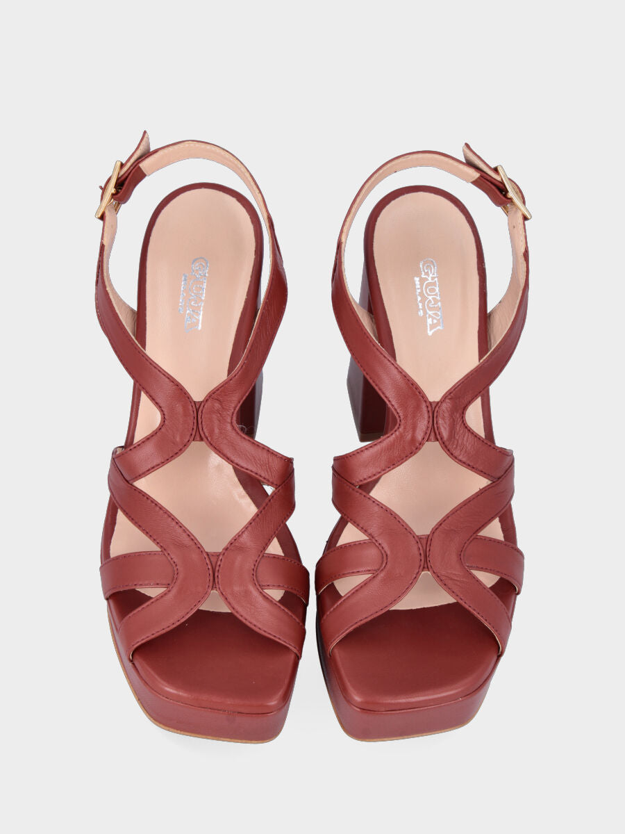 Brown leather sandal with wavy straps