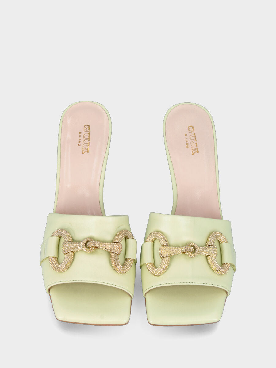 Light green leather slipper with studded metal clamp