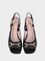 Sandalo slingback nero in pelle con morsetto e punta aperta