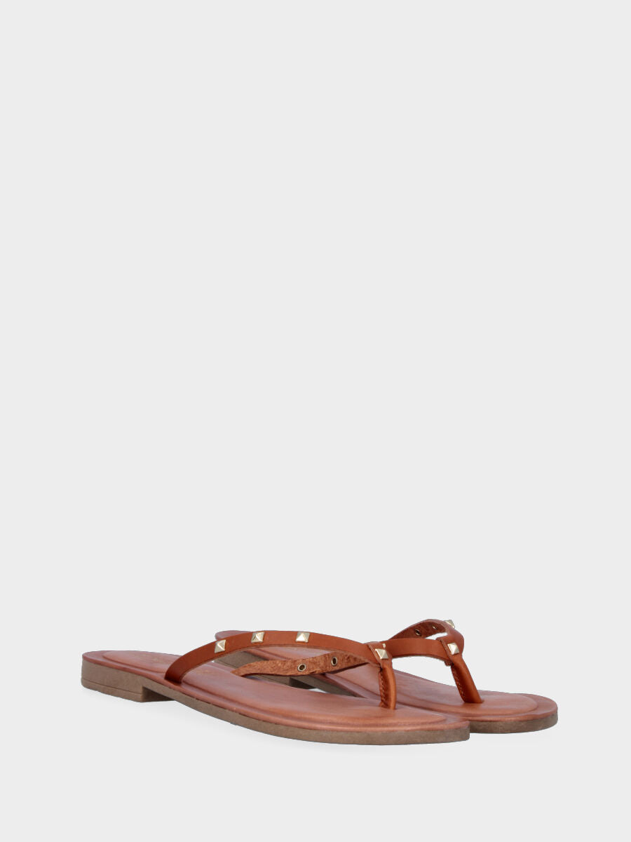 Brown leather slipper with studs
