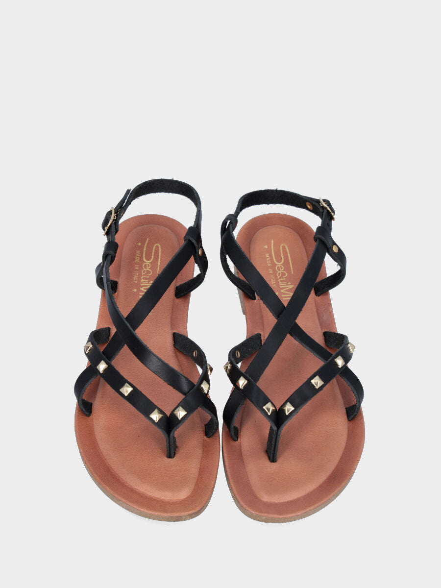 Sandale tongs noire en cuir avec lanières croisées et clous