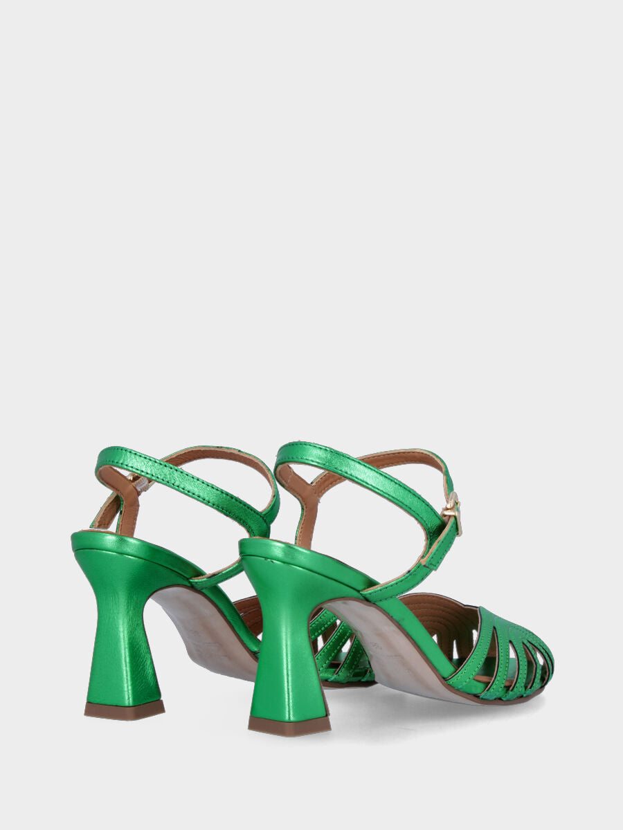 Green laminated sandal with straps on the sole