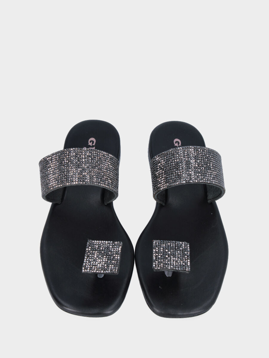 Sandale tongs noire en cuir avec bride et bouton ornés de cristaux