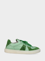 Sneaker verde menta in pelle con inserti in camoscio