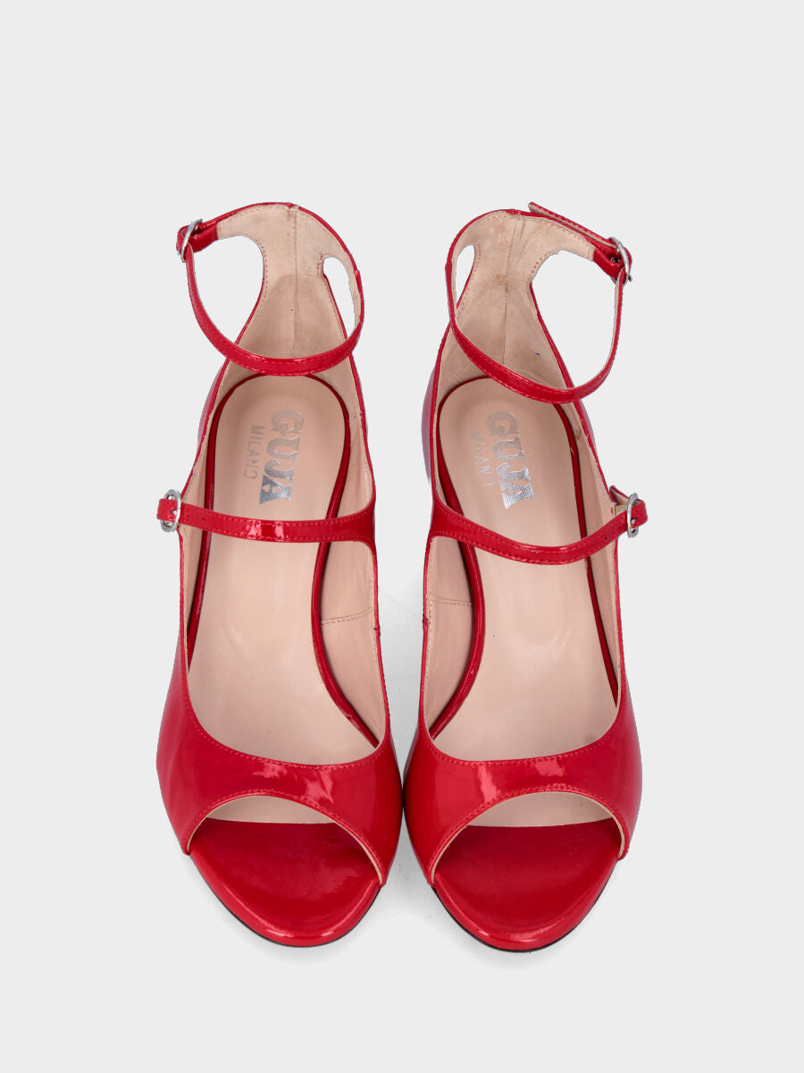 Sandalo monoblocco in vitello rosso con fascia ripiegata
