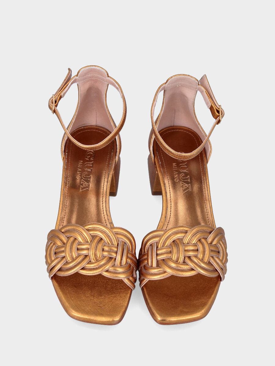 Gold sandal in laminated leather with braided hoop straps