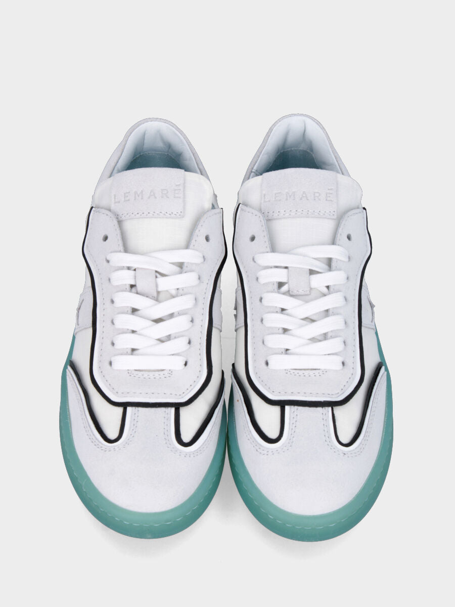 Sneaker bianca in pelle con suola colorata