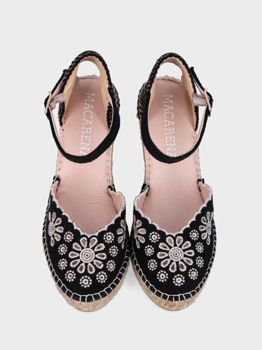 Black fabric peasant with perforated flowers