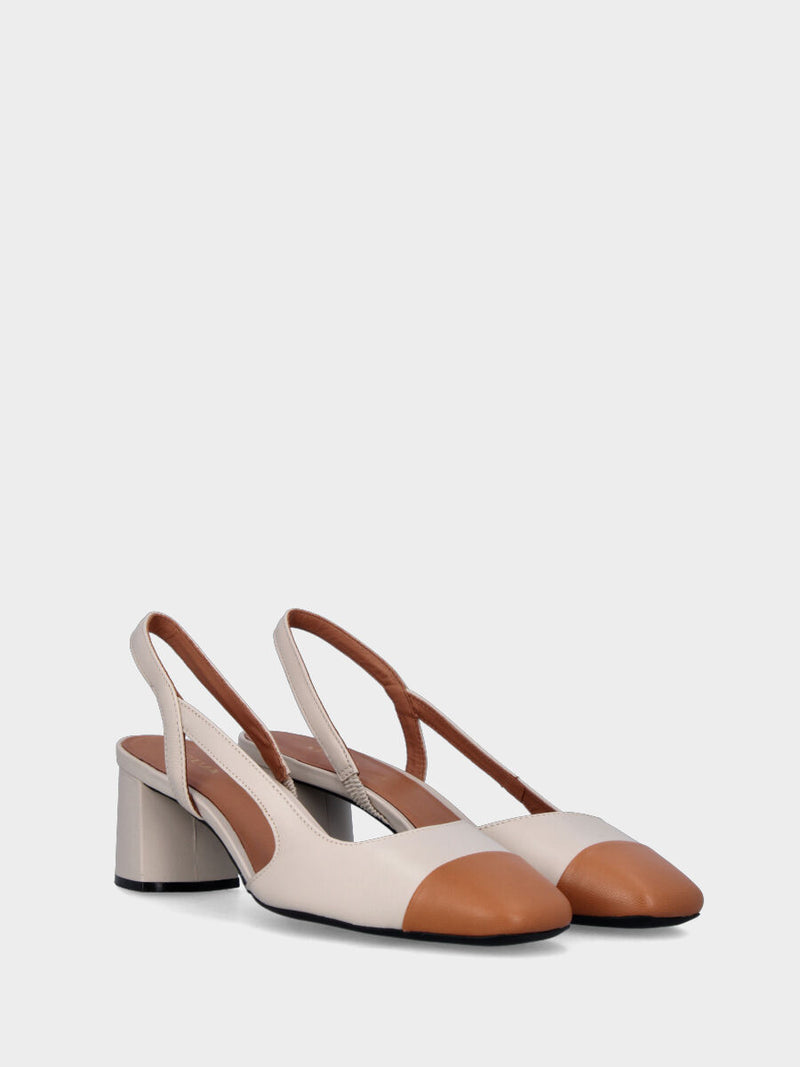 Slingback nude in pelle con cinturino asimmetrico e punta cuoio