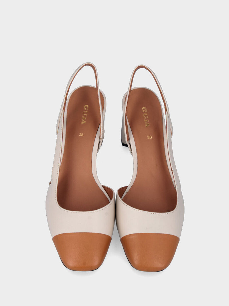 Slingback nude in pelle con cinturino asimmetrico e punta cuoio