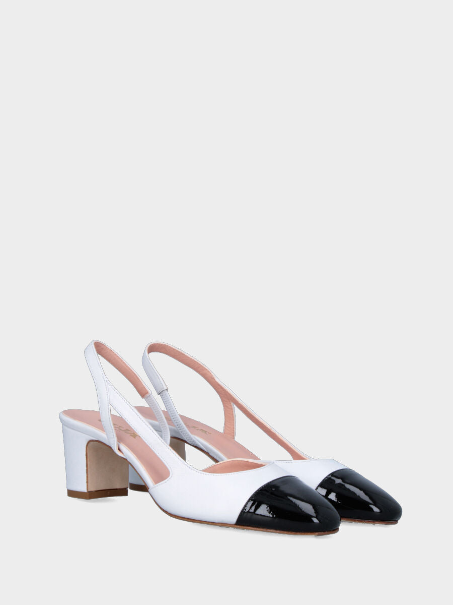 Slingback blanc en cuir avec bride asymétrique et bout brillant noir
