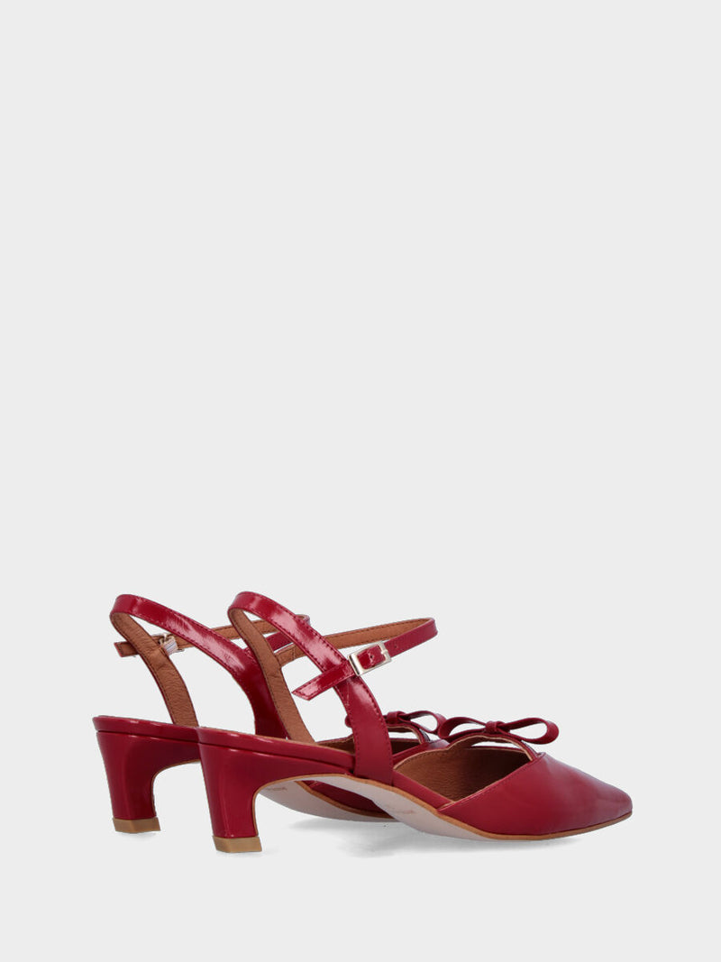 Slingback in vernice rossa con tacco a coda e fiocchetto sulla pianta