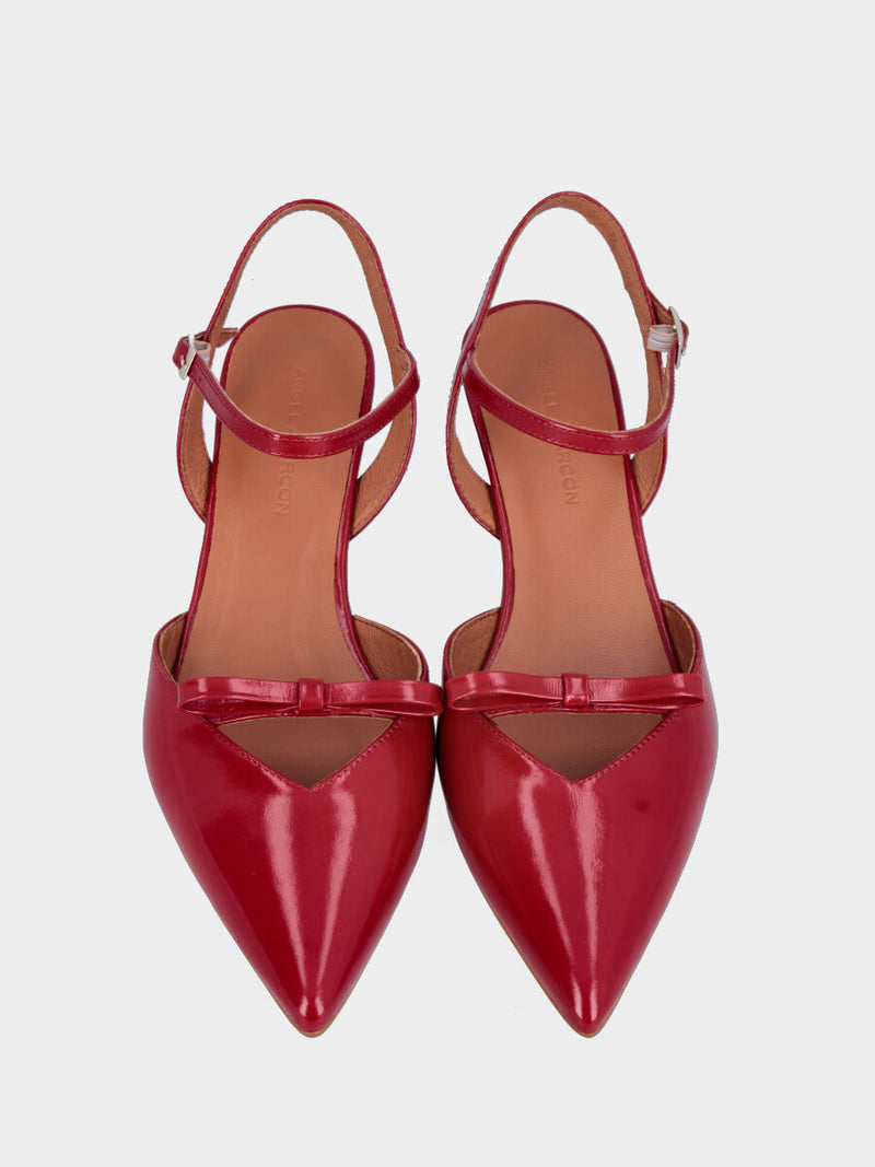 Slingback in vernice rossa con tacco a coda e fiocchetto sulla pianta