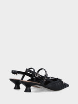Slingback in nappa nera con fiocchetto e cinturini incrociati