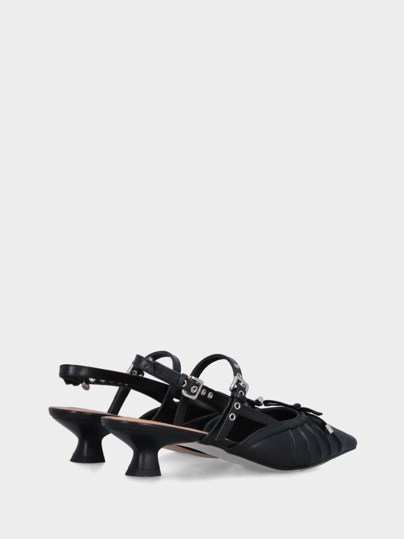 Slingback in nappa nera con fiocchetto e cinturini incrociati