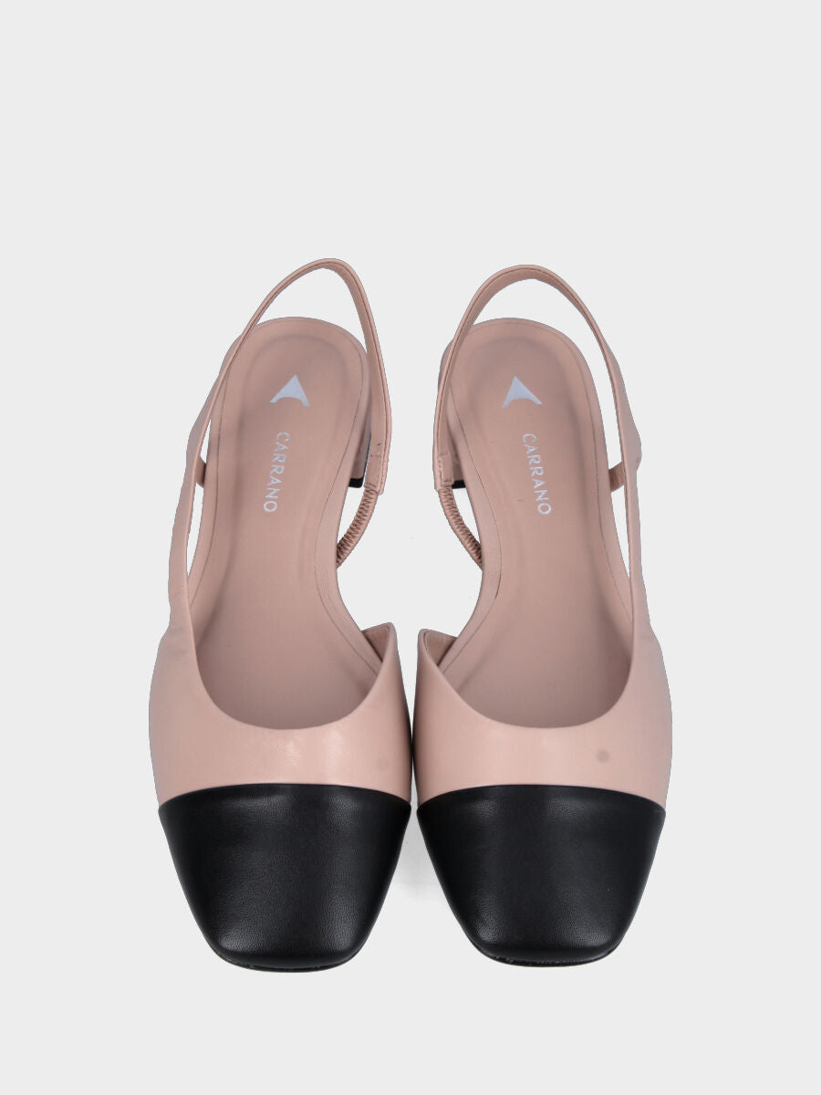 Slingback in nappa bicolore beige e nero con cinturino asimmetrico