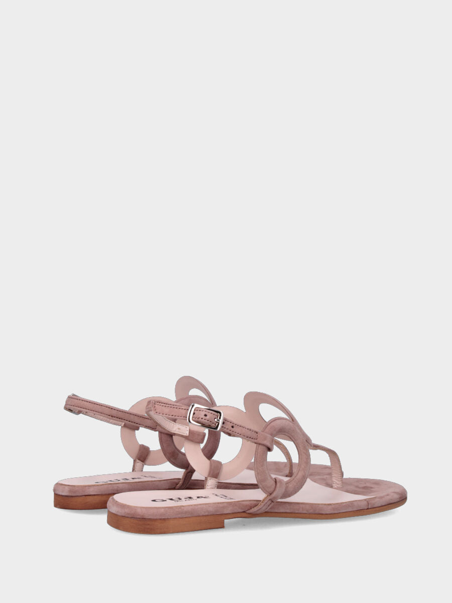 Sandalo infradito in camoscio rosa antico con cerchi decorativi
