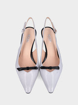Slingback in verlux bianco con tacco e fiocchetto a contrasto