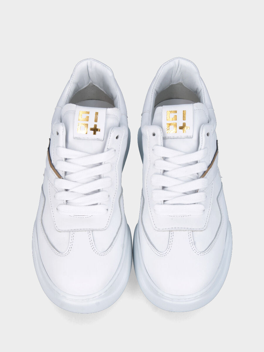 Sneaker in vitello bianco con toppone in naplak e suola alta