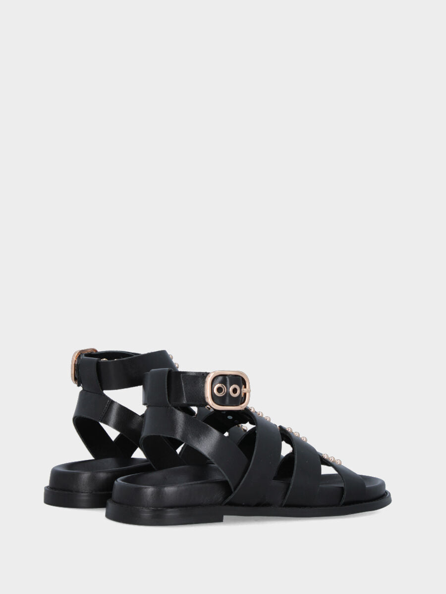 Sandalo in vitello nero con fusbet e listini decorati