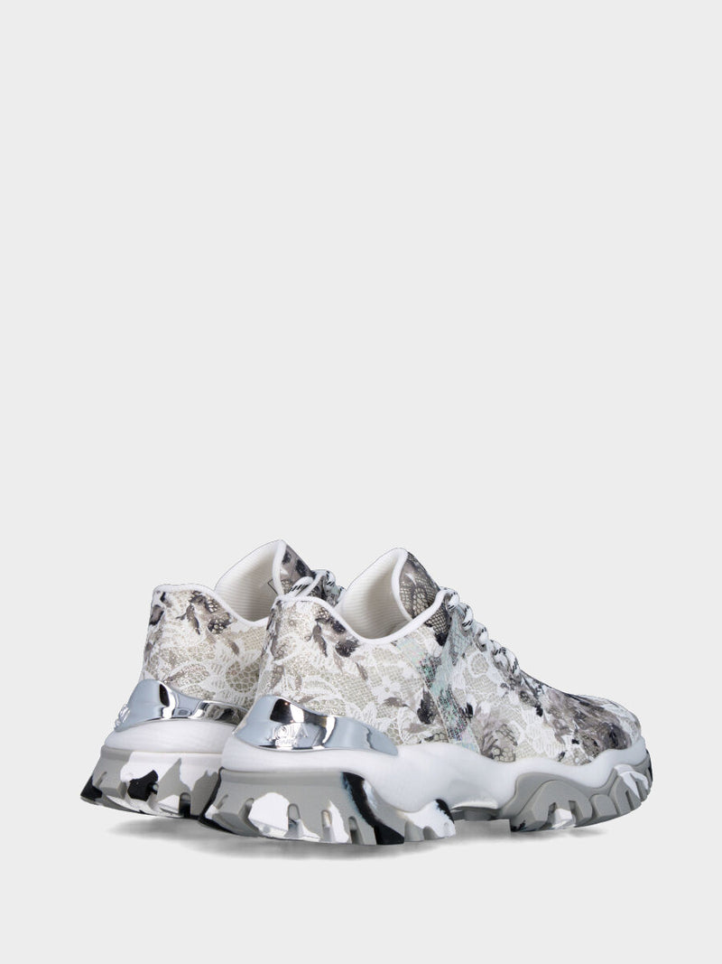 Sneaker in tessuto bianco con merletti e fondo in gomma