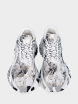 Sneaker in tessuto bianco con merletti e fondo in gomma
