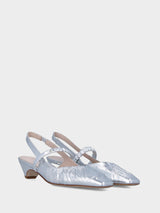 Slingback in laminato argento con tacco incavato e tomaia incrociata