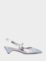 Slingback in laminato argento con tacco incavato e tomaia incrociata