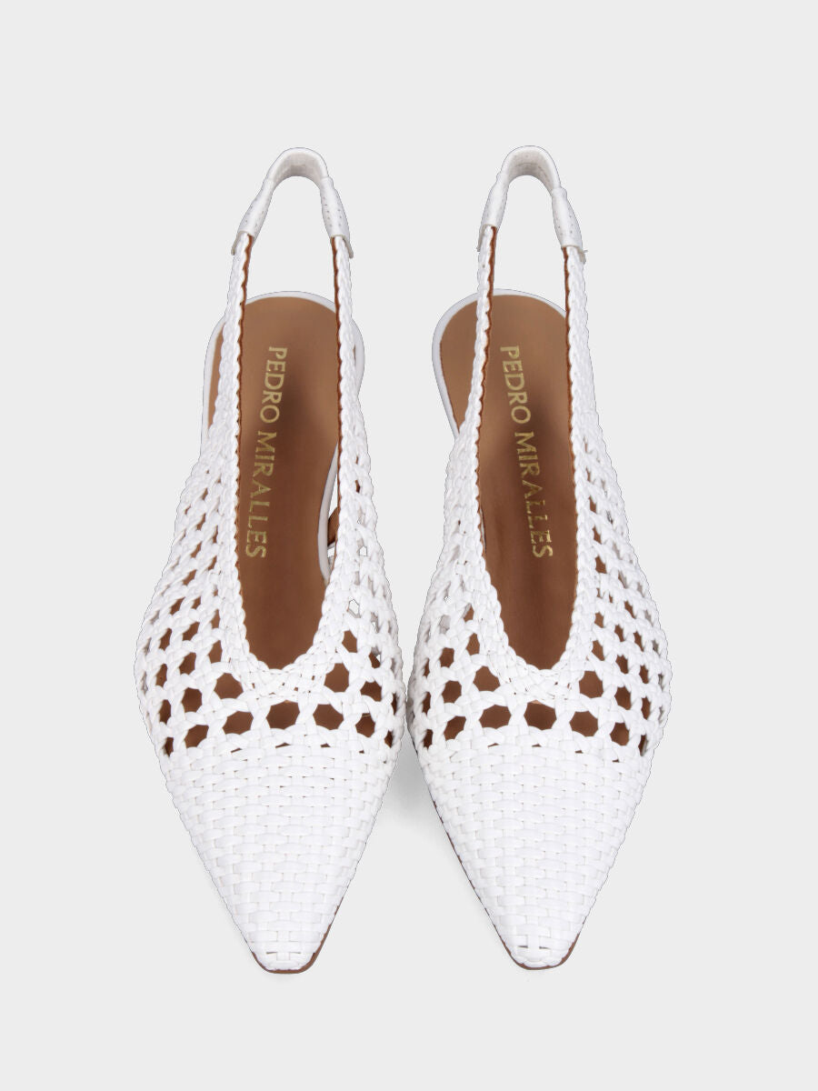 Slingback in nappa bianca con tomaia traforata e tacco rocchetto